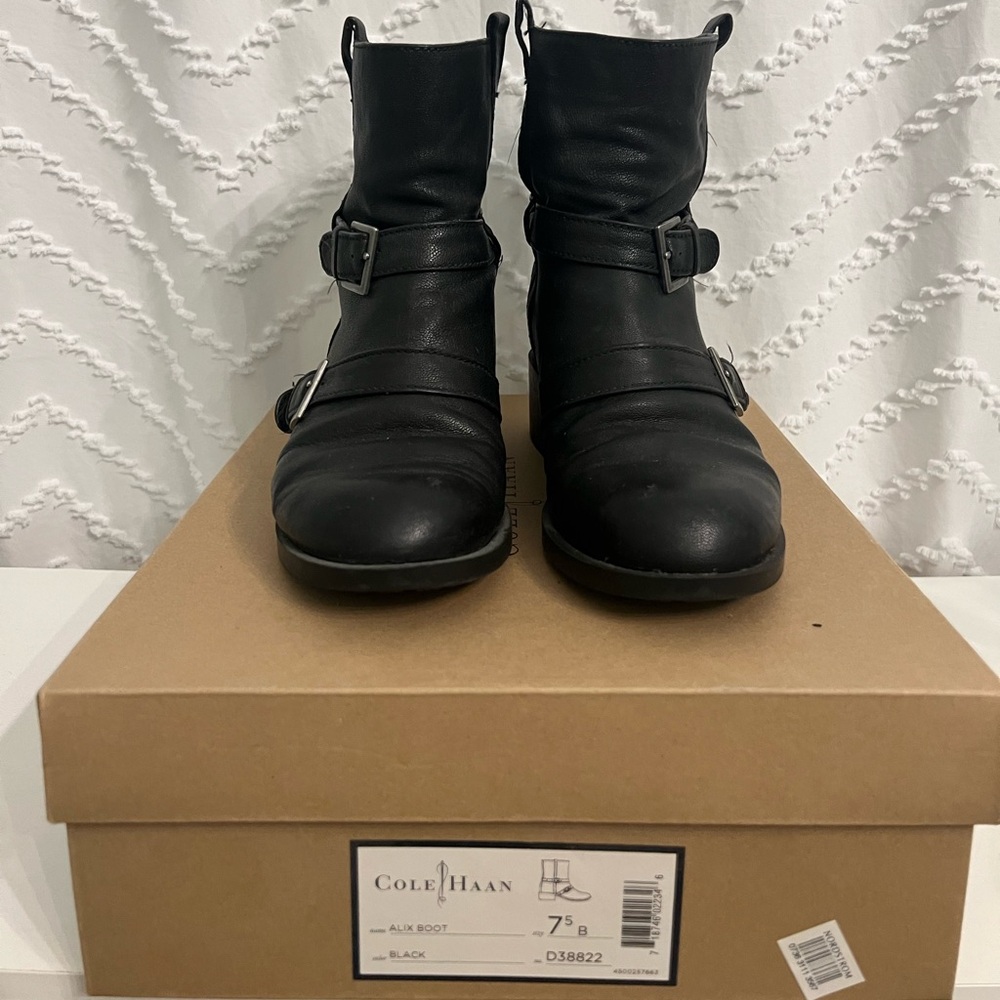 Black leather Cole Haan boot with buckle detail